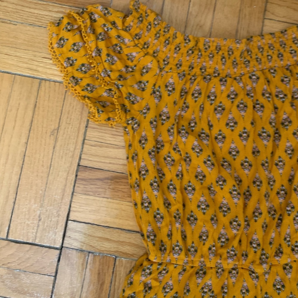 Yellow off the shoulder patterned jumpsuit